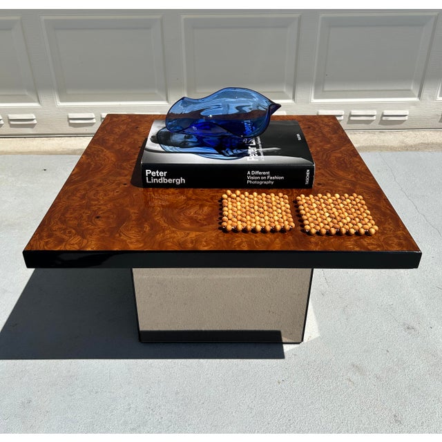 A stunningly sophisticated and dazzling coffee table designed and manufactured by Paul Michel, France, in the 1970s. This...