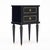 A sophisticated pair of French Louis XVI style side tables constructed in ebonized wood with restrained gilt-brass...