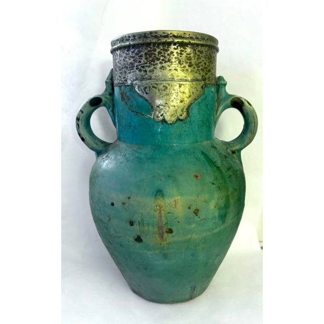 A wonderfully weathered late 19th-century Chinese provincial wine or storage jar, likely dating to the late Qing dynasty,...
