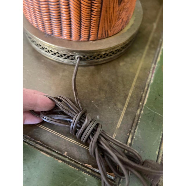 This is the coolest and quirkiest lamp we have found. Presented in a burnt orange glaze over a plaster like ceramic, three...