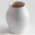 Subtle throw lines and natural textures from the firing process give this terracotta vase a vintage look. Finished in a...