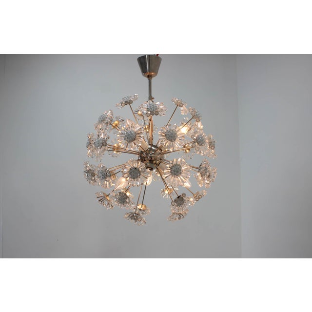 Dandelion chandelier made by Preciosa in 1970. Restored. Carefully cleaned. Very good condition. E14 bulbs. This piece is...