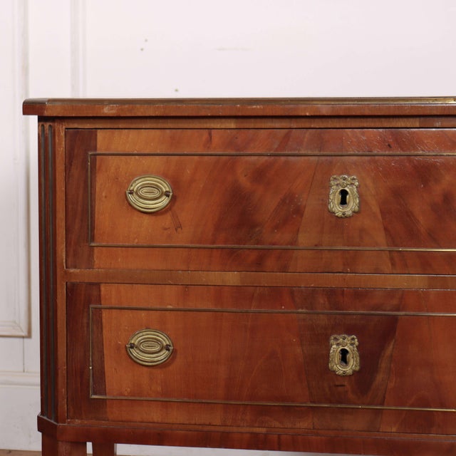 Small 19th C Italian 2 drawer mahogany commode. 1880 This piece is designed in the style of the selected designer and/or...