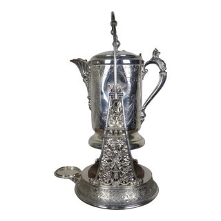 Early 20th Century Tilting Silver Pitcher on Stand For Sale