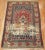 One of kind, hand-knotted Mid-20th-century Turkish throw size oriental rug with a quirky distressed traditional motif....