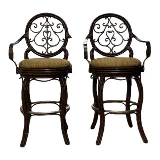 Swivel Iron and Rattan Bar Stools - A Pair For Sale