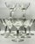 These mouth blown early 20th century crystal champagne coupes have a deep cut swirl line design. As they are mouth blown...