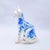 This artwork features a delicately rendered Sphynx cat, its porcelain-like surface adorned with intricate blue patterns...