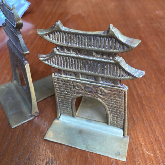 Small brass pagoda book ends. Very detailed. Interior design enthusiast must. E3