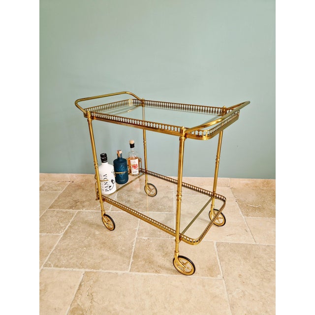 Magnificent mid-century rolling serving cart in openwork brass and clear glass, two tiers, 1950s-60s. French production,...