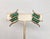 Goldtone two lines of faux-jade beads butterfly clip back earrings. Marked "NAPER PAT. PEND." on the clips. Made in 1964....