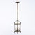 Petite brass lantern from France made with a solid brass structure. The simple lines and curved forms are reminiscent of...