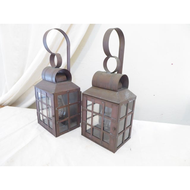 This pair of copper lantern sconces use up to 75 Watt Edison base bulbs. They ship with the glass removed and ship in a...