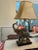 The handsome elephant lamp has a silk and Capiz shell shade. His tusks need to be glued on but they’re taped to the base....