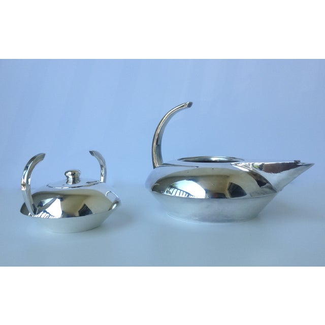 Vintage; Mid-Century French silver service by the Escapade Company, a handmade artisanal silver company. These pieces are...