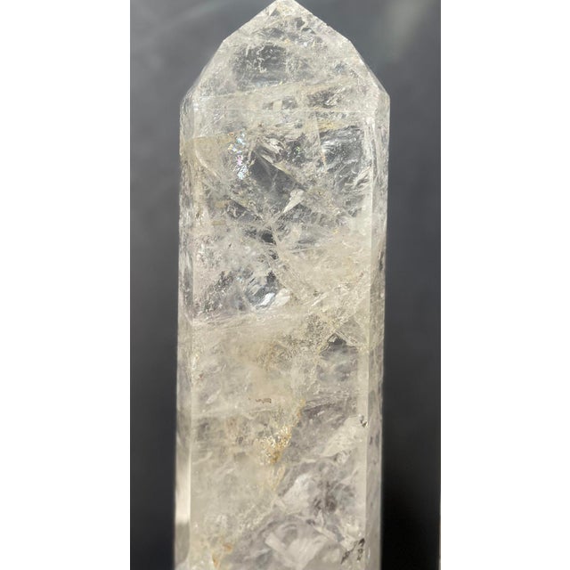 A set of three vintage rock crystal tower points, each standing gracefully on a giltwood hexagon base. Made in the USA in...