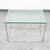 Unique heavy metal and glass table. Unknown maker. High quality and well designed.