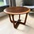 1968 Lane Perception round side / end table. Original walnut veneer covers the center of the top, while the edges are...