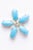Stunning natural Sleeping Beauty Turquoise gemstone earrings in a flower motif. The stones are in an oval, cabochon shape...