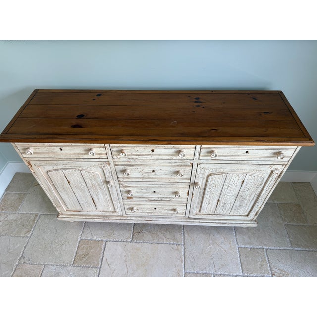 Farmhouse Style buffet with distressed finish. Fantastic storage and quality.