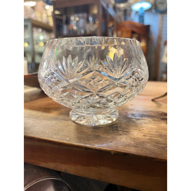 Footed Crystal cut glass rose bowl. Features a globose shape, a short pedestal foot, Cut Criss-Cross & Fan Design. This is...
