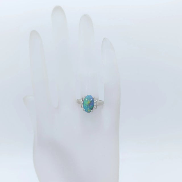 Contemporary Black Opal Oval and White Diamond Cocktail Ring in Platinum, size 5.5 For Sale - Image 3 of 6