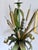 French painted tole botanical chandelier, circa 1965–1975, sculptural design of cattails, flowers, and foliage. Hand-...