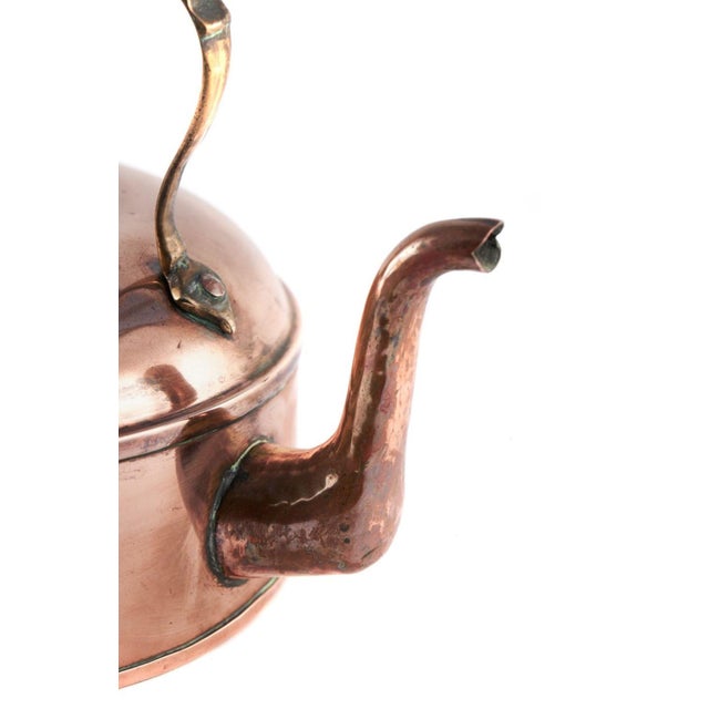 This is a good quality 19th Century antique copper kettle of squat form with rotating wooden handle, removable lid and...