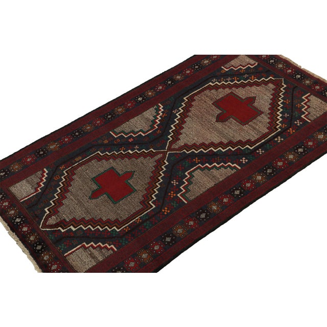 Hand-knotted in wool & goat hair circa 1950-1960, this 4x6 vintage Baluch runner is from a new curation of tribal rugs in...