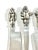 Vintage 1990s Wallace Silversmiths Christmas cheese serving set featuring three stainless-steel utensils topped with...