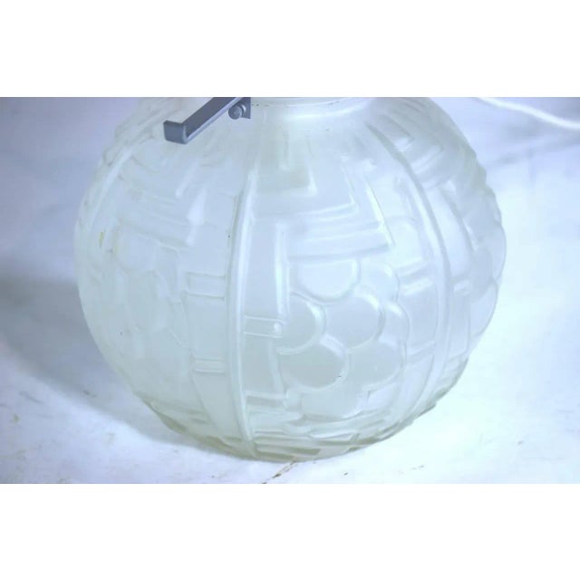 A highly decorative Classic Art Deco raised design translucent glass lamp base. Base takes a bulb and beautifully lights...