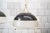 Pair of pendant lamps with matte nickel-plated brass frame, acrylic shade, and white opal glass. Model 1238 Manufacturer...