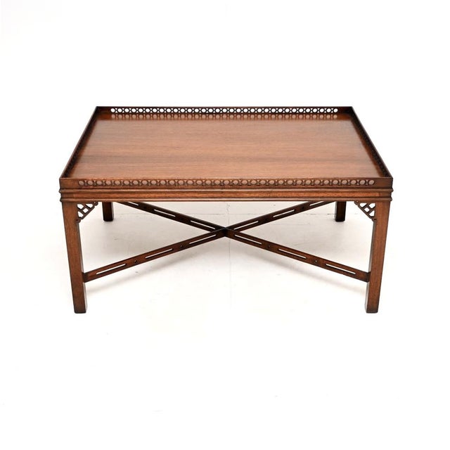 A smart and beautifully made antique Georgian style coffee table. This was made in England, it dates from around the...