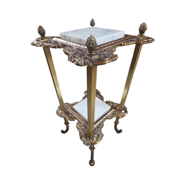 Overview Elevate your interior styling with this exceptionally elegant Vintage Mid-Century Hollywood Regency Pedestal...
