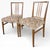 A refined pair of mid-century dining chairs by Gordon Russell, showcasing the maker’s hallmark balance of craftsmanship,...