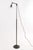 Early 20th century adjustable industrial style brass floor lamp with a disk shade in opal glass. Height of pole is...