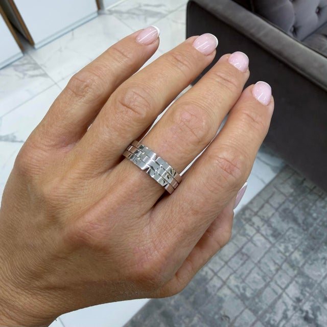 Brand: Cartier Gender: Man's Metal Type: 18K White Gold Ring Size: 9.5 Width: 7.00 mm Weight: 12.37 grams Man's CARTIER...