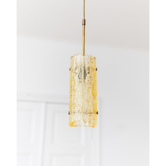 This vintage ceiling lamp, designed by carl fagerlund for orrefors in the 1960s, is a stunning example of timeless design....