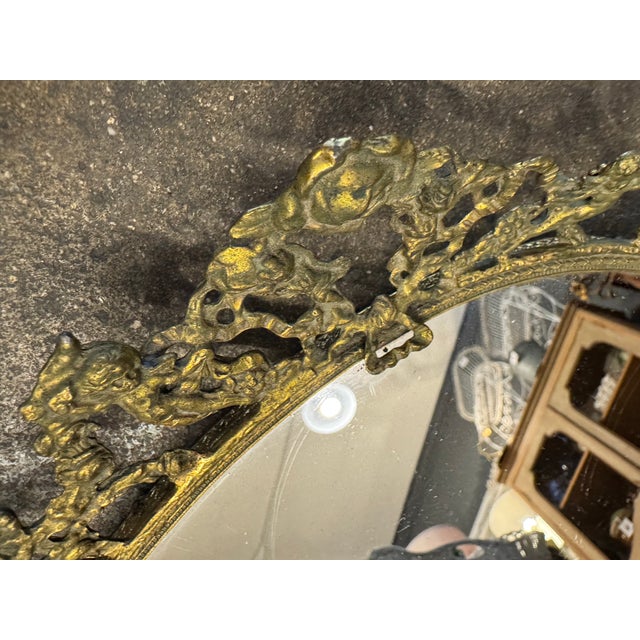 Gorgeous large size French Ormolu style mirror and brass oval shaped vanity tray.