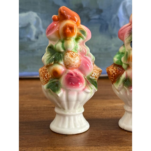 Charming and vibrant Italian style fruit topiary salt and pepper shakers. Please see condition details noted. Most items...