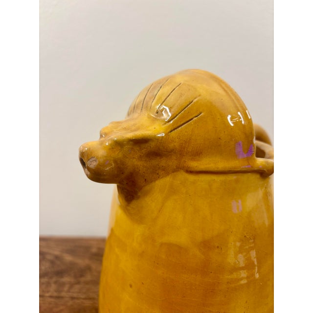 A charming mid-century ceramic pitcher from Biot, France, dating to approximately the 1950s–1960s. The sculptural form...