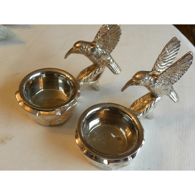 Set of two metal Hummingbird holders, with sauce cups. Excellent table presentation for any sauce or condiment. In the...