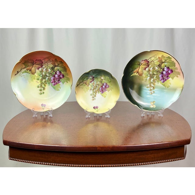 This antique 5-piece Bavarian porcelain tea and serving set is unified by a stunning, lush botanical theme celebrating...