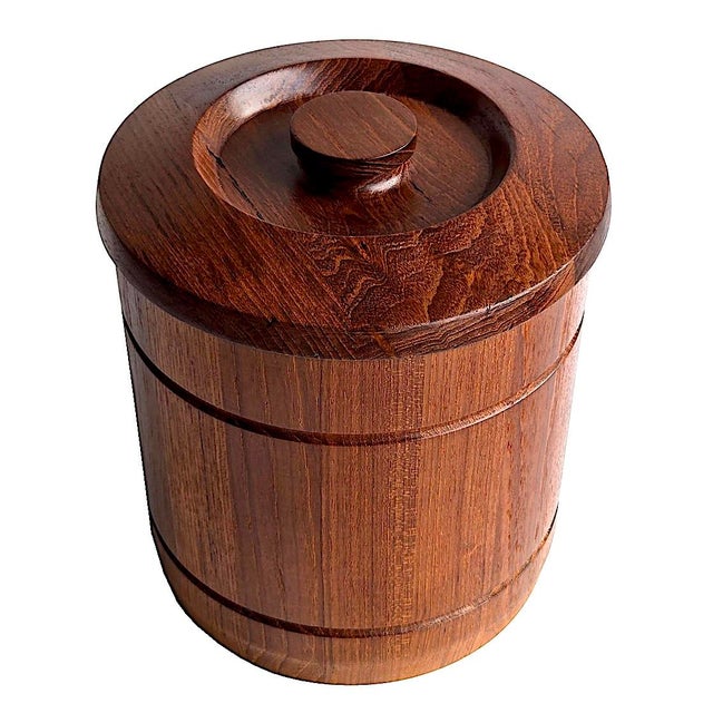 Offered is a vintage staved and lathed Teak wood ice bucket with lid and plastic liner made by Goodwood in Thailand in the...