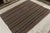 Hand woven in wool originating from Turkey between 1950-1960, this vintage mid-century Kilim enjoys one of the most subtle...