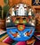 A wonderfully graphic vintage Mexican folk-art wall mask, hand formed from warm reddish terracotta/earthenware clay and...