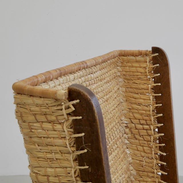 Highback Chair designed by Chris Wegerif, made of an Oak structure with woven cane seating and back (The back has been...