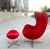 Red Arne Jacobsen Egg Chair With Ottoman by Fritz Hansen In 1958, Arne Jacobsen designed the Egg for the lobby and...