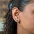 A matched pair of Zambian emeralds glows in lush green in these solid 14K yellow gold bezel-set solitaire stud earrings....