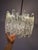 A fascinating classic of east german modernism: this expansive ice-glass chandelier from veb narva perfectly captures the...